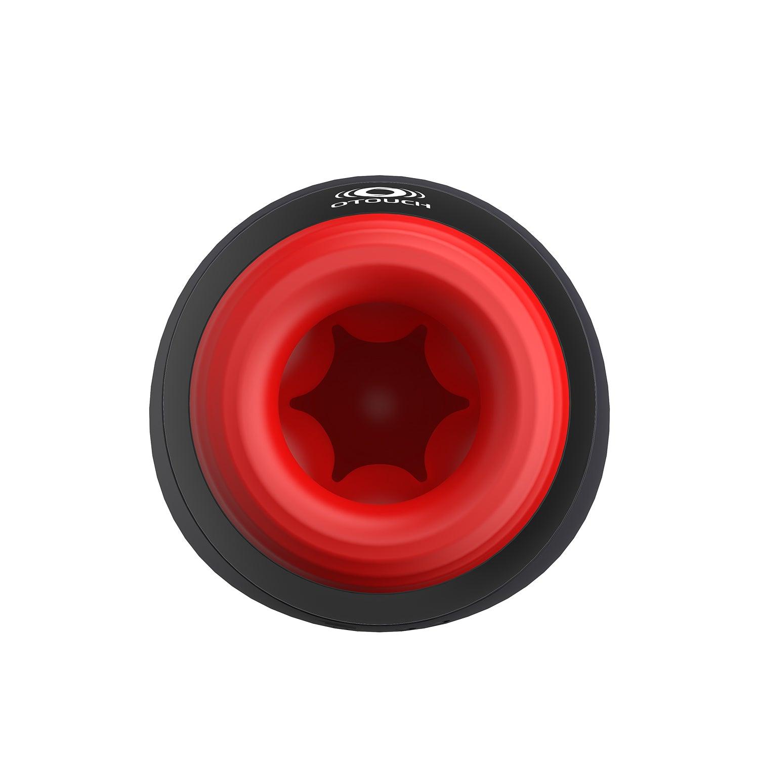 OTOUCH Pleasure Engine male masturbator front view of red silicone internal chamber showing realistic star-shaped textured cavity