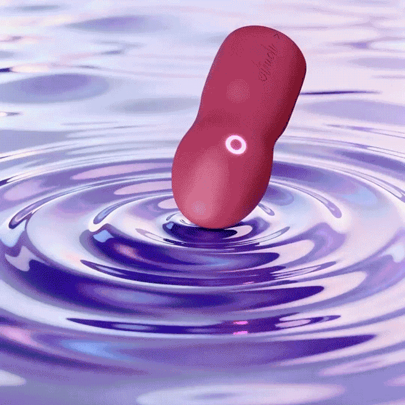 OTOUCH YU BattleHelm fingertip vibrator waterproof test – pink vibrator submerged in water splash