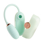 OTOUCH LOUIS mint green vibrator disassembled showing clitoral suction head G-spot vibrating egg and protective clamshell cover