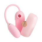 OTOUCH LOUIS pink vibrator disassembled showing clitoral suction head G-spot vibrating egg and protective clamshell cover