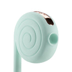 OTOUCH Lollipop mint green clitoral suction head close-up showing spiral design suction opening and rose gold magnetic charging contact