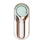 OTOUCH Lollipop mint green dual stimulation vibrator stored inside open rose gold luxury charging storage box showing compact travel-ready design