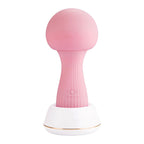 OTOUCH Mushroom Vibrator Pink on charging dock with mood light