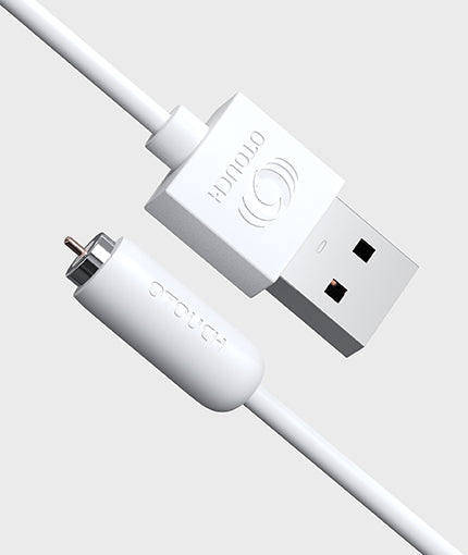 White audio cable with plug and USB connector on a light gray background